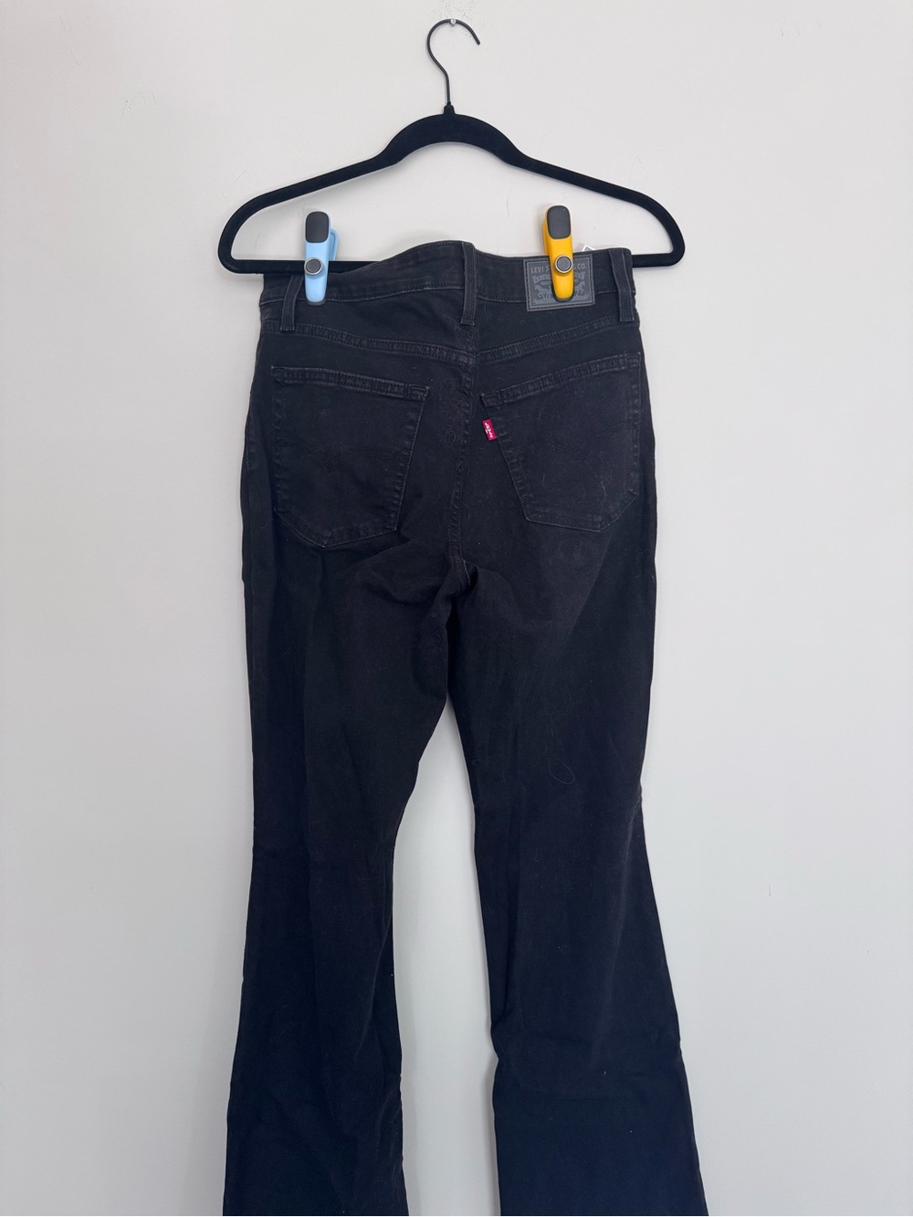 Levi's Black Flare Jeans with Subtle Back Pocket Tab